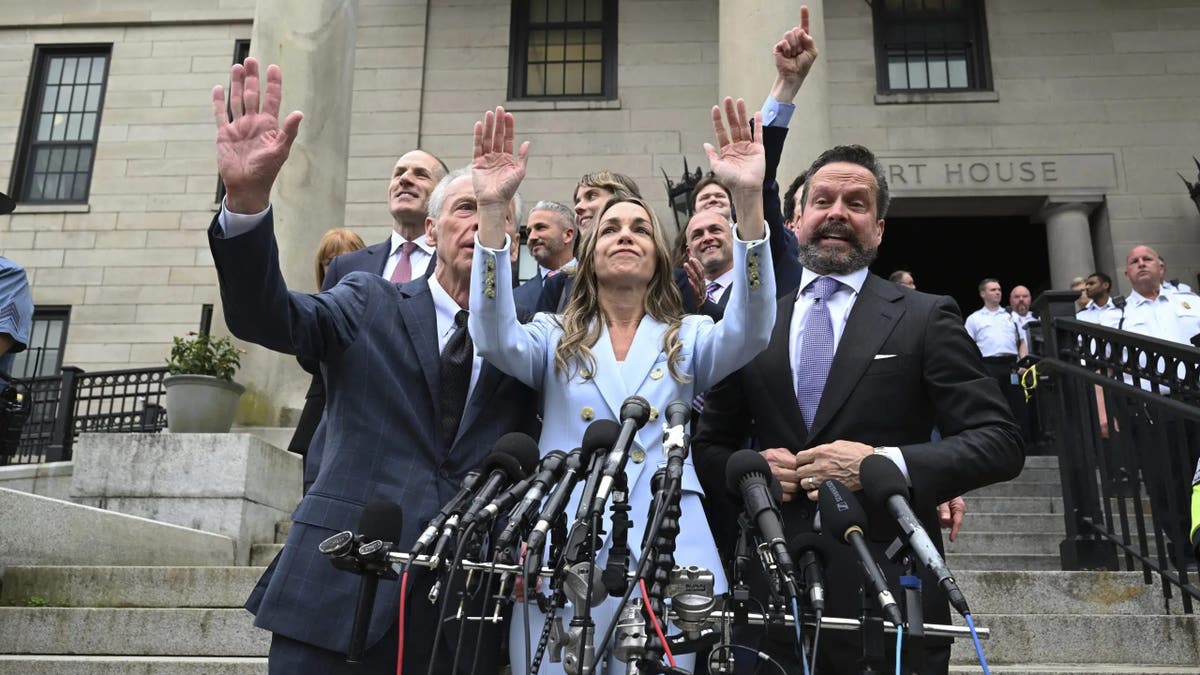 Karen Read, her lawyers and her family speak to reporters outside the courthouse after her acquittal on murder charges