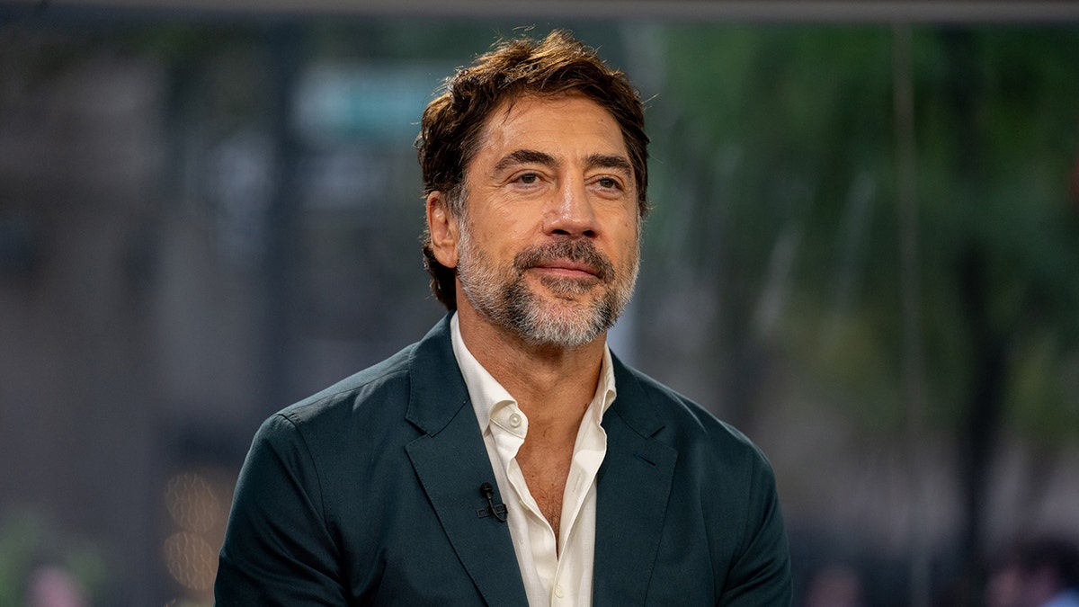 Javier Bardem standing
