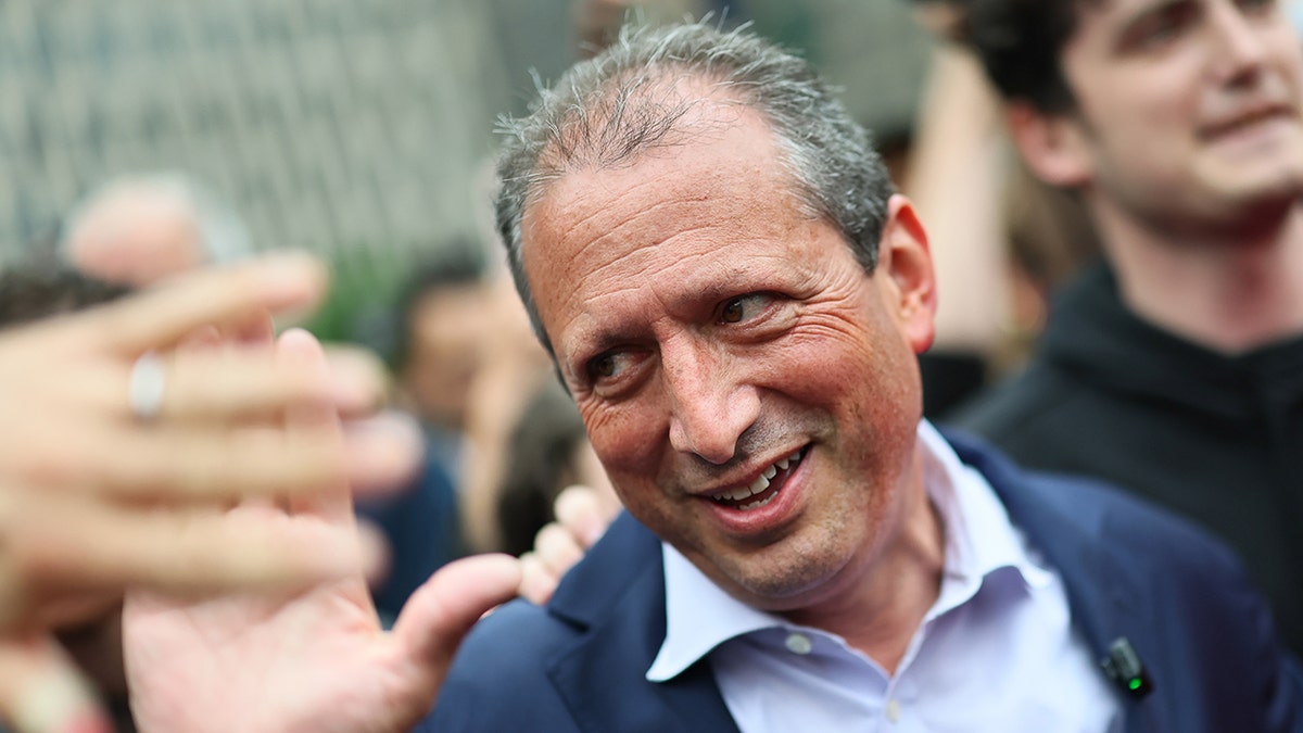 New York City comptroller Brad Lander waving to a crowd on Tuesday
