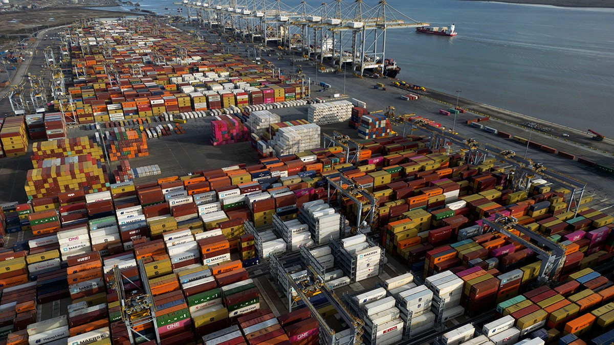 Shipping containers wait to be processed at London Gateway port, in Stanford-le-Hope, on the Thames estuary east of London, England, on Feb. 5, 2025.