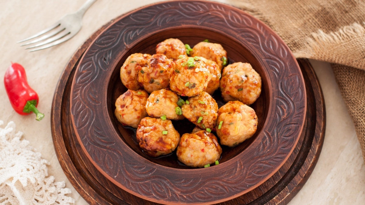 Thai-style chicken meatballs in dish