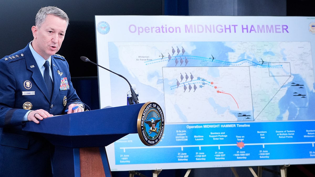Joint Chiefs Chairman Gen. Dan Caine speaking next to timeline graphic of operation