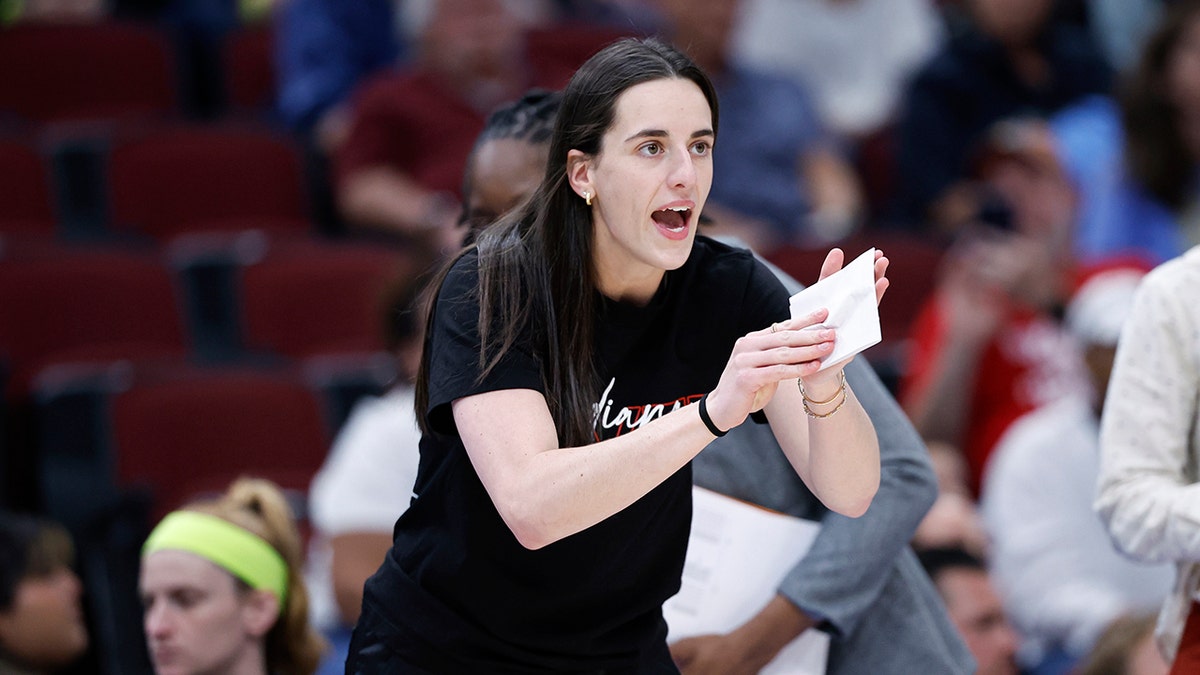 Caitlin Clark applauds