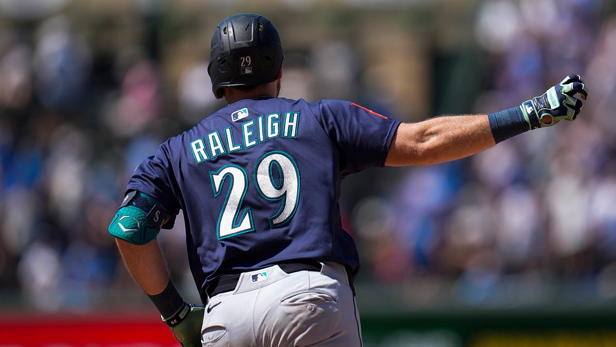 Cal Raleigh celebrates