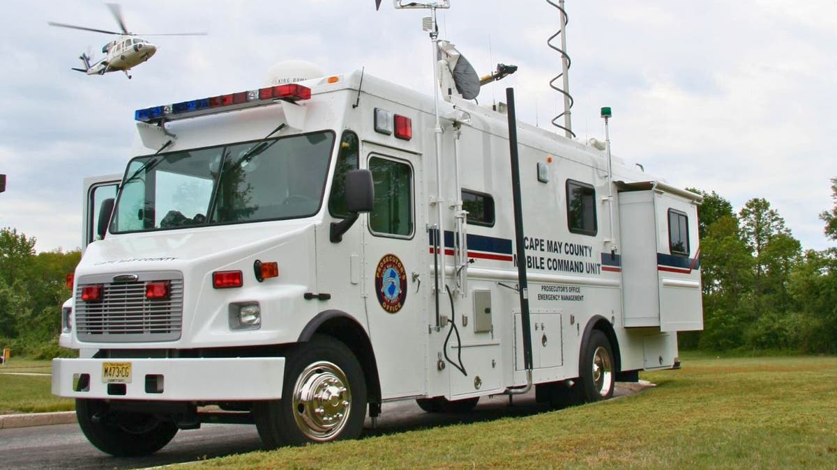 Laura Caron indicted on sex crimes , police van outside