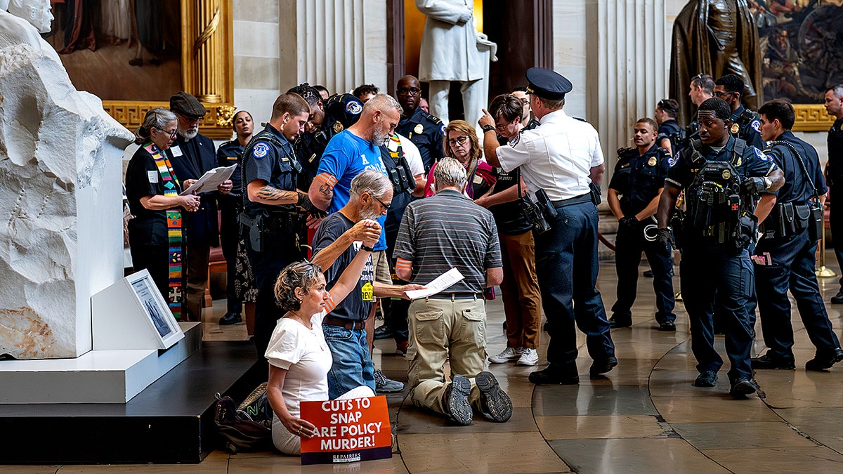 Capitol Police arrest demonstrators in Rotunda