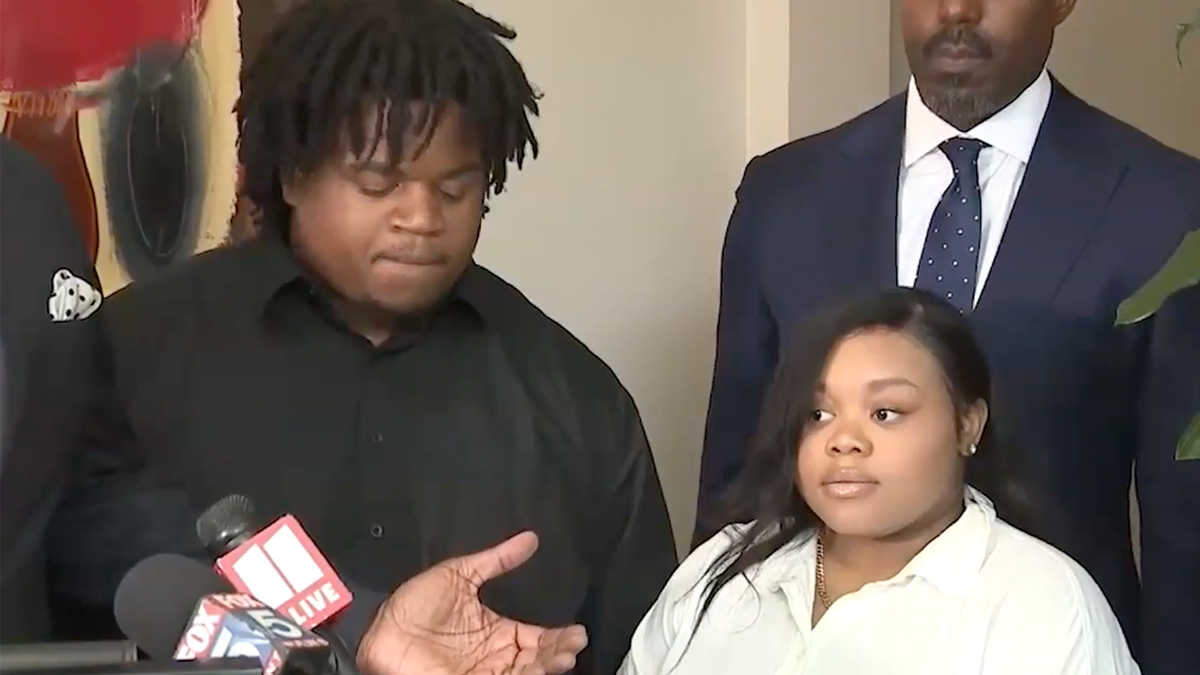 The baby’s parents, Jessica Ross and Treveon Taylor Sr., pictured at a news conference.