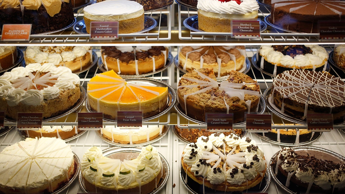 Cheesecakes are on display at a Cheesecake Factory in 2013.