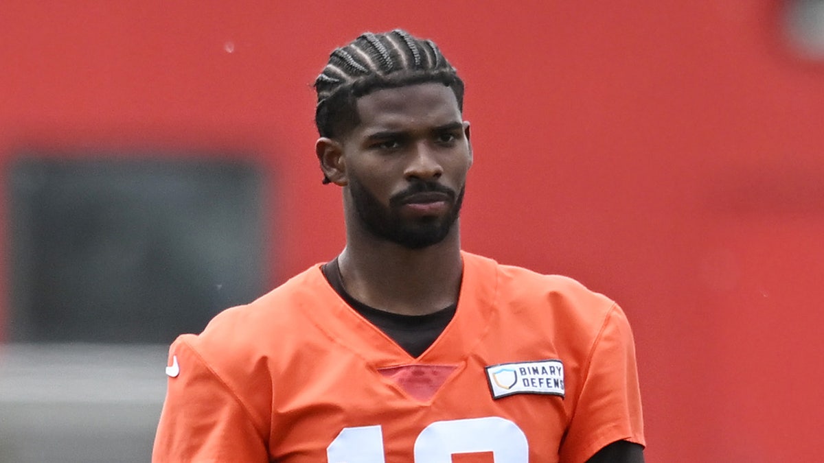 Shedeur Sanders looks on