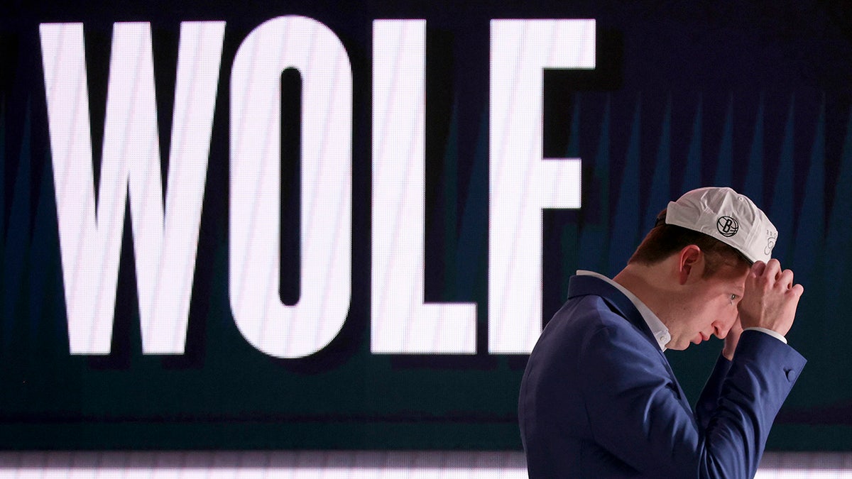 Danny Wolf walks off the stage