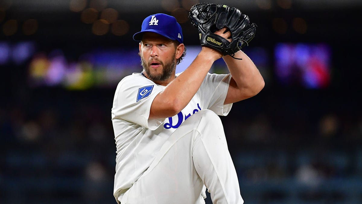 Clayton Kershaw throws pitch
