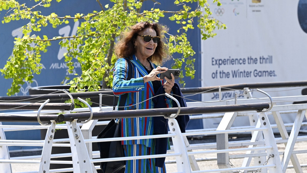 Diane Von Furstenberg wears a striped suit   successful  Venice