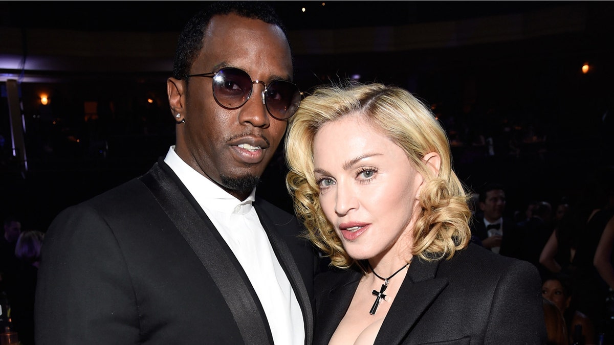 Diddy and Madonna airs for a photo