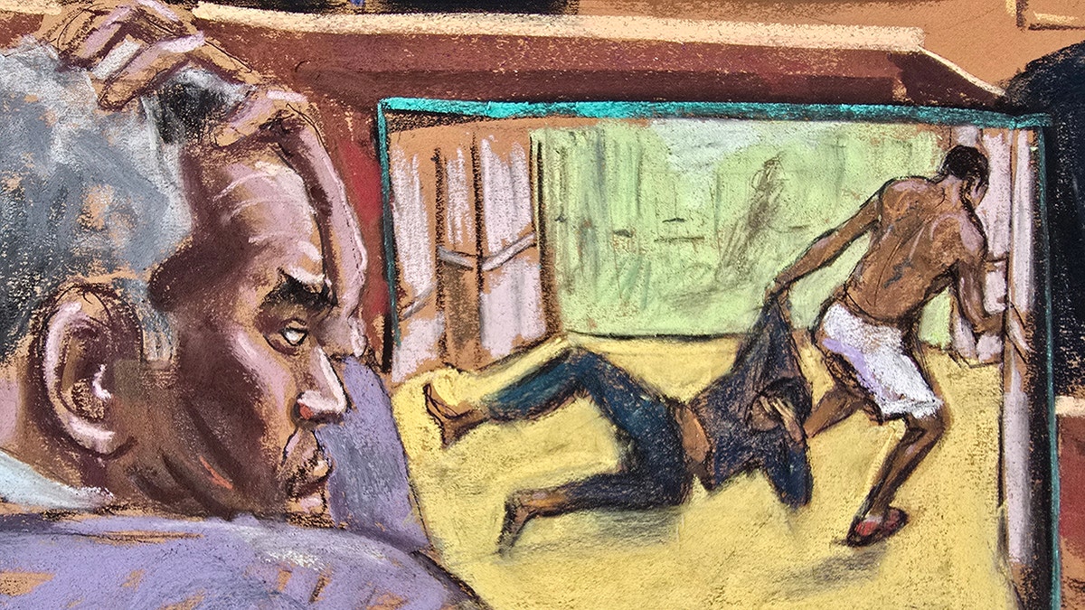 Diddy watching a video in court
