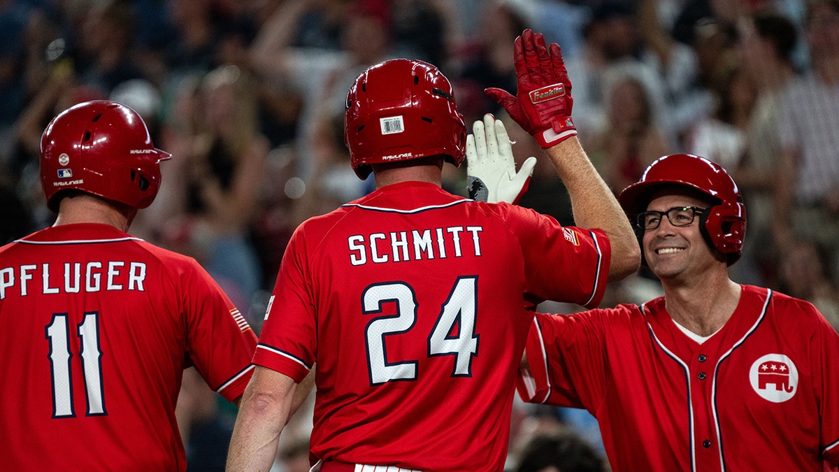 Eric Schmitt high-fives