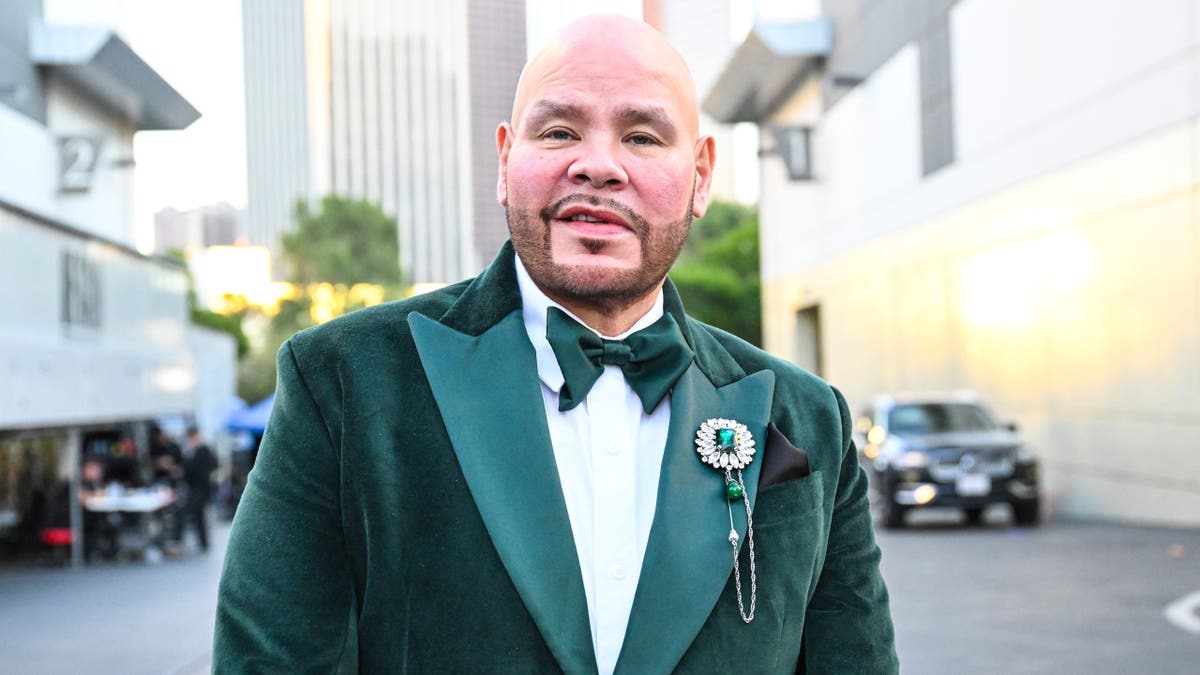 Fat Joe in a green suit