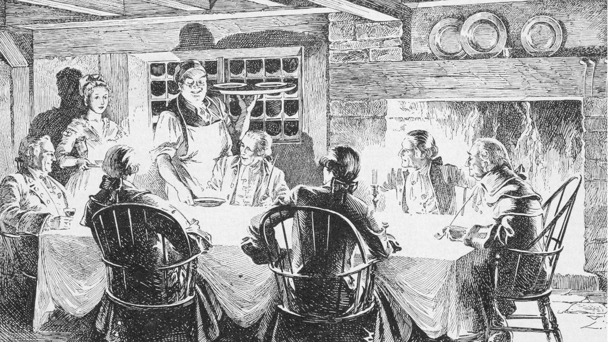 Founders at meal in tavern