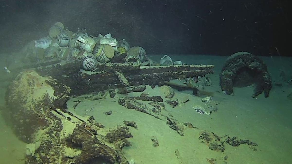 Exterior of shipwrecked vessel at bottom of sea
