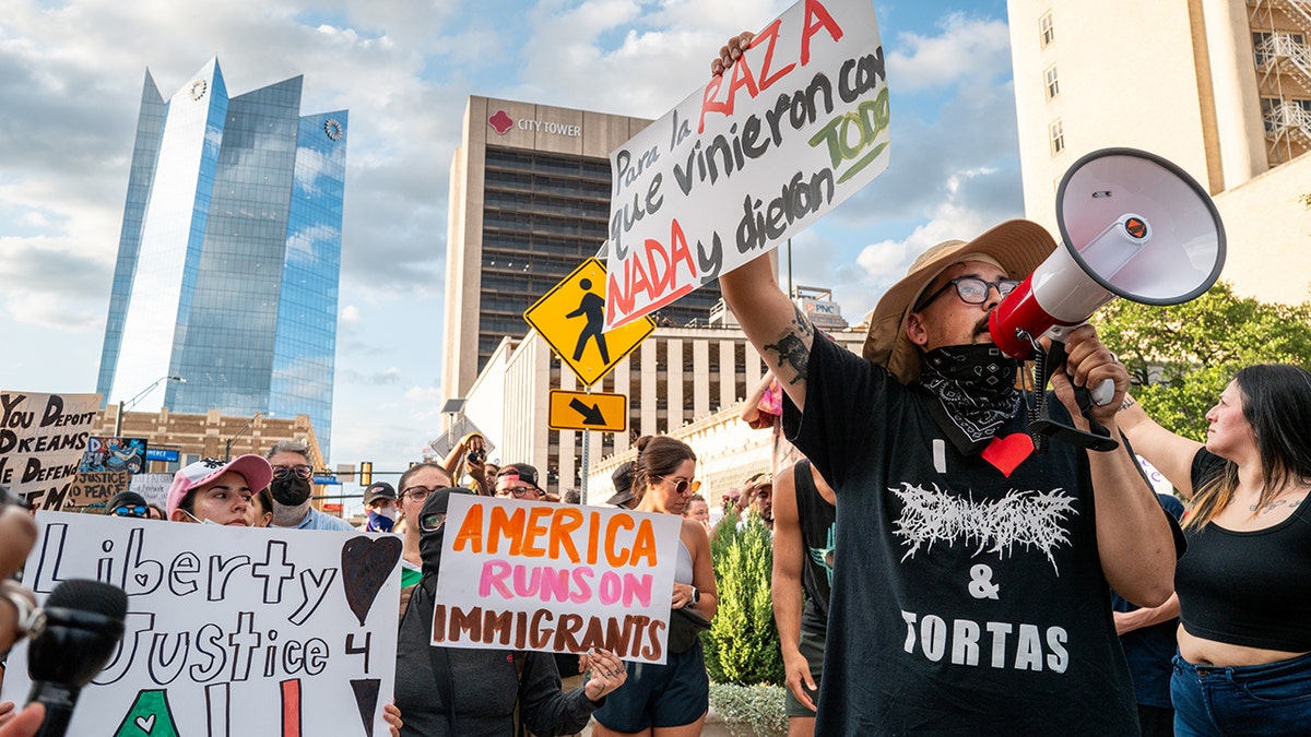 Protesters clasp signs and outcry successful San Antonio, Texas