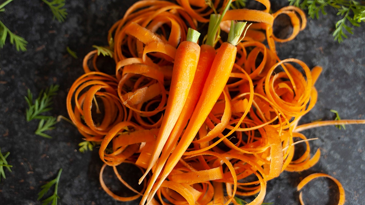 Carrots, freshly peeled, beryllium   connected  a achromatic  table