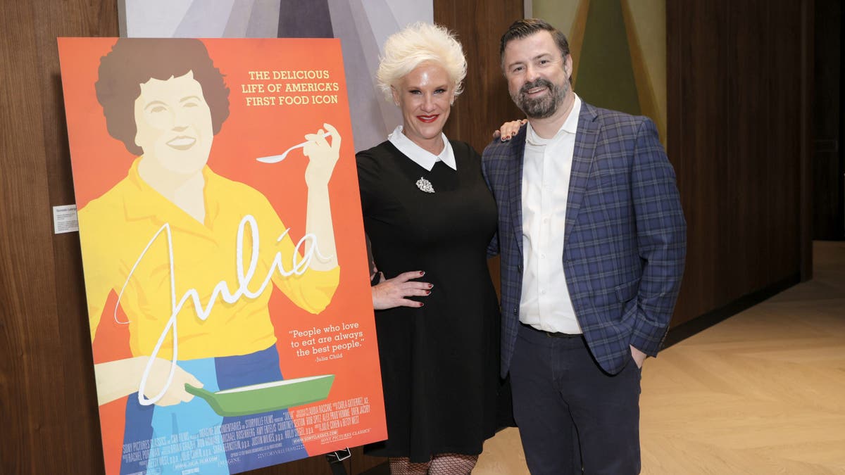 anne burrell posing with her husband stuart claxton 