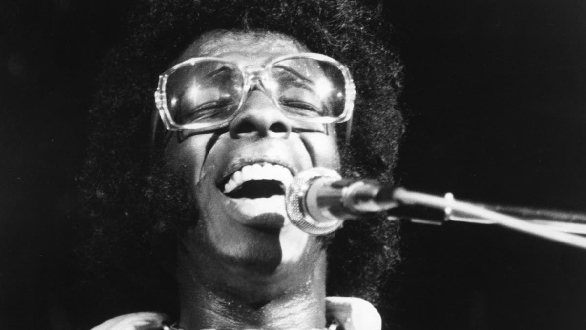 Sly Stone singing