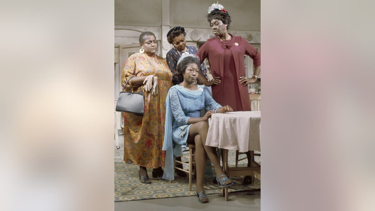 Lynn Hamilton and cast members in Sanford and Son