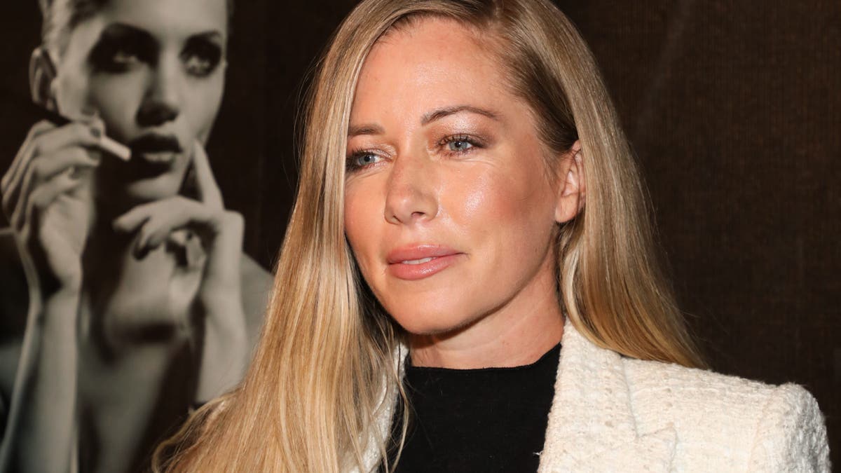 kendra wilkinson wearing a white blazer 