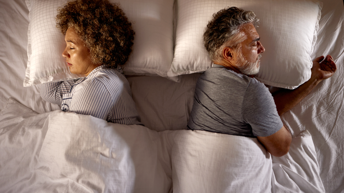 couple sleeping in bed