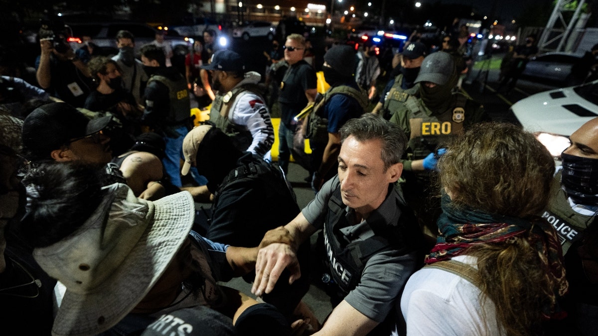Protesters artifact vehicles from entering oregon leaving the Delaney Hall ICE installation pursuing the reported flight of 4 migrants successful Newark, United States, connected June 12, 2025.