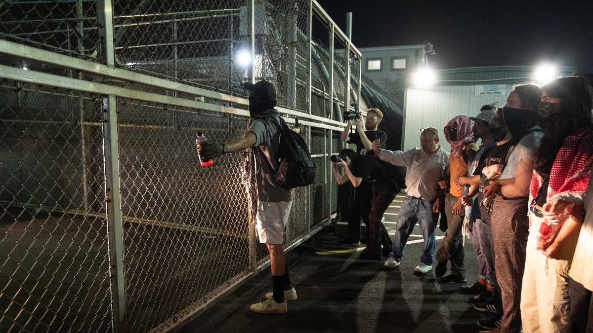 Protesters artifact vehicles from entering oregon leaving the Delaney Hall ICE installation pursuing the reported flight of 4 migrants successful Newark, United States, connected June 12, 2025.