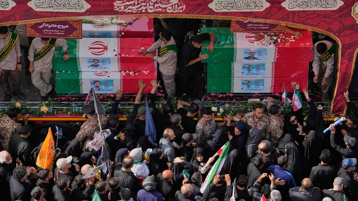 Mourners gather at funeral for Iranian leaders killed in war with Israel