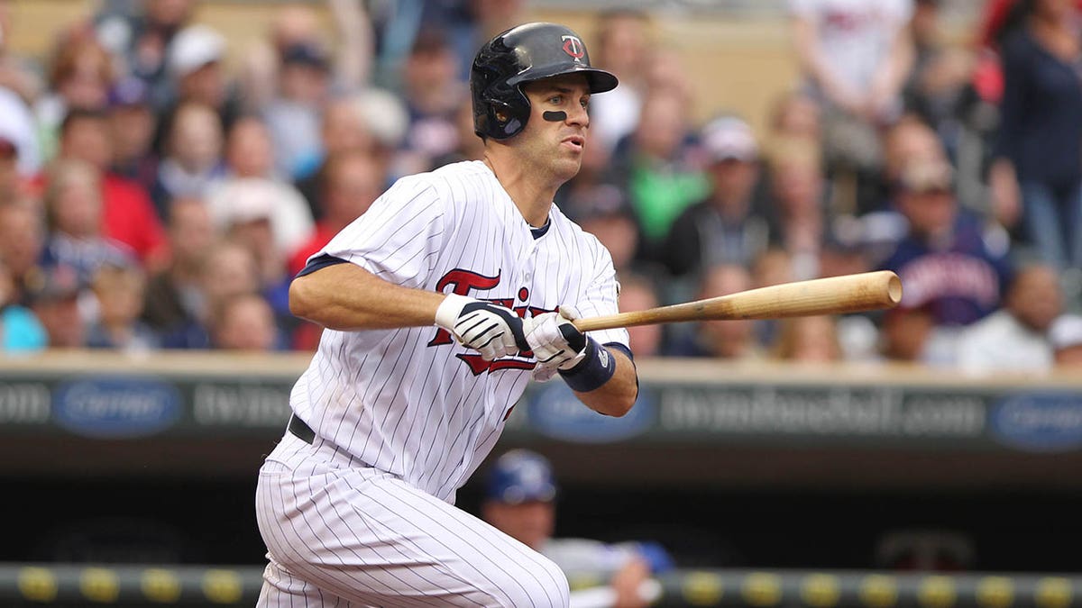 Joe Mauer swings