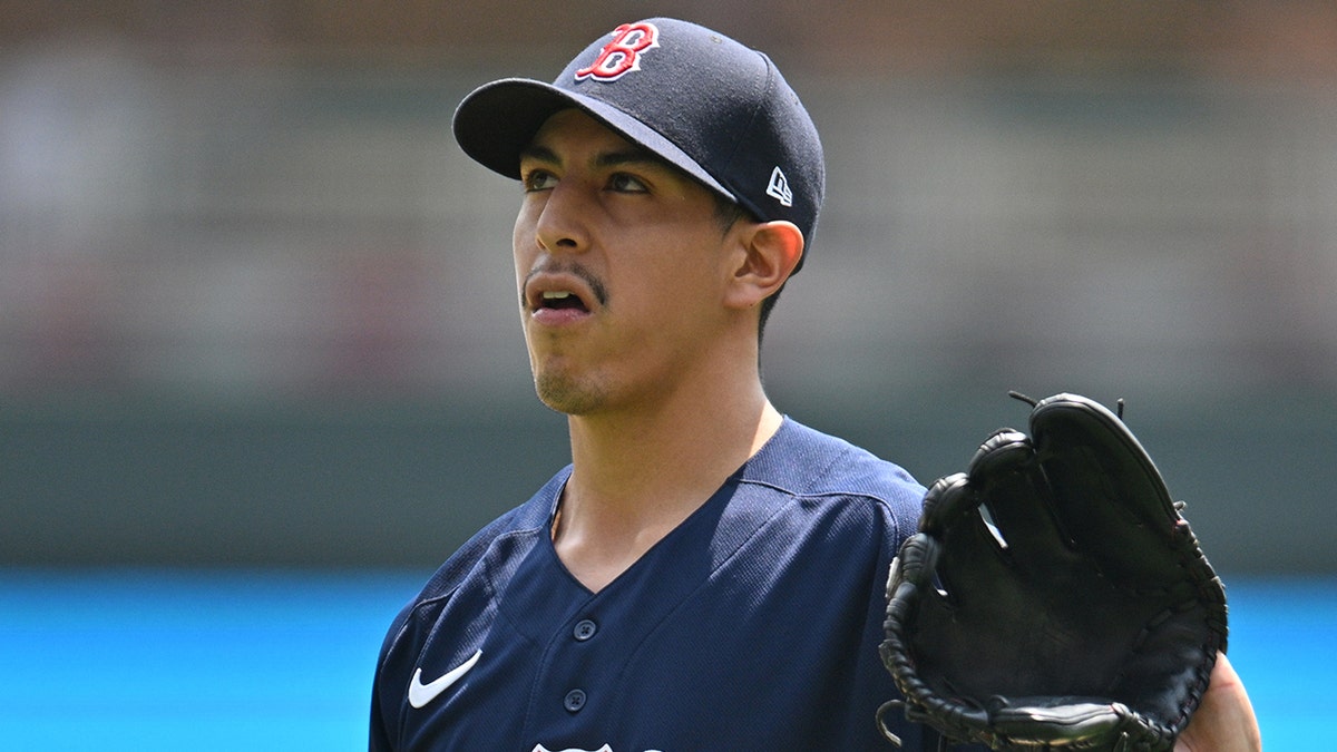 Boston Red Sox starting pitcher Justin Garza, #63, reacts after giving up a home run to Minnesota Twins designated hitter Byron Buxton during the first inning at Target Field.