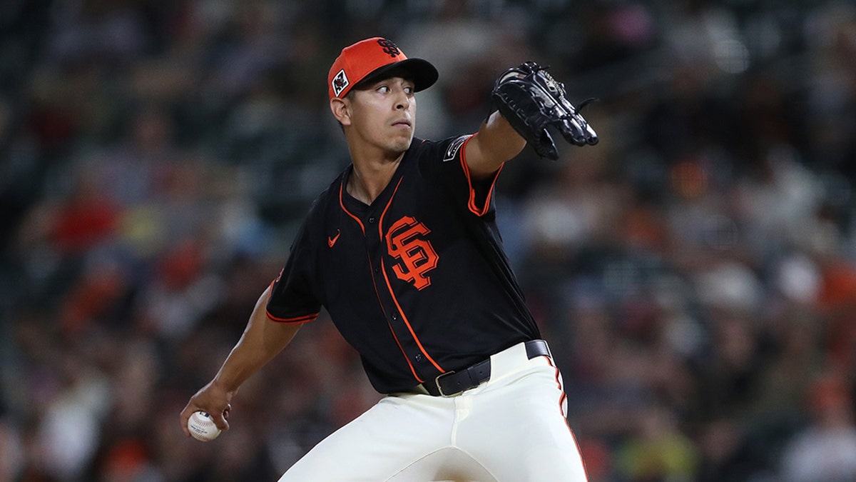 Justin Garza pitches