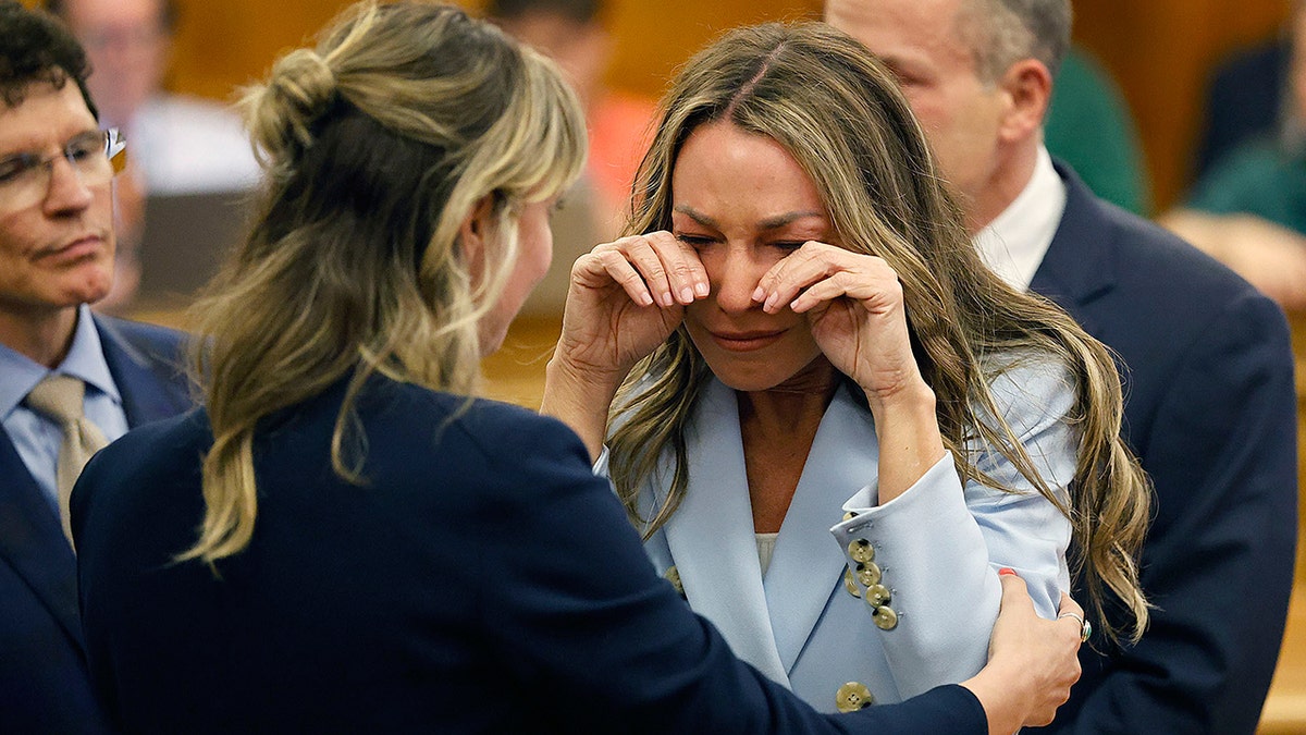 Karen Read crying in court hearing the verdict.