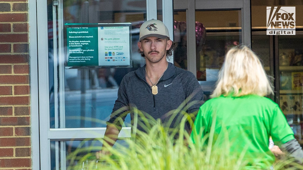 A close-up of Grayson Chrisley shopping.