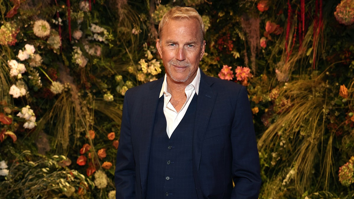 Kevin Costner in a blue suit