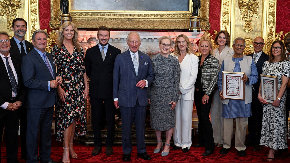 King Charles with his guests as they're all smiles at St. James's Palace.