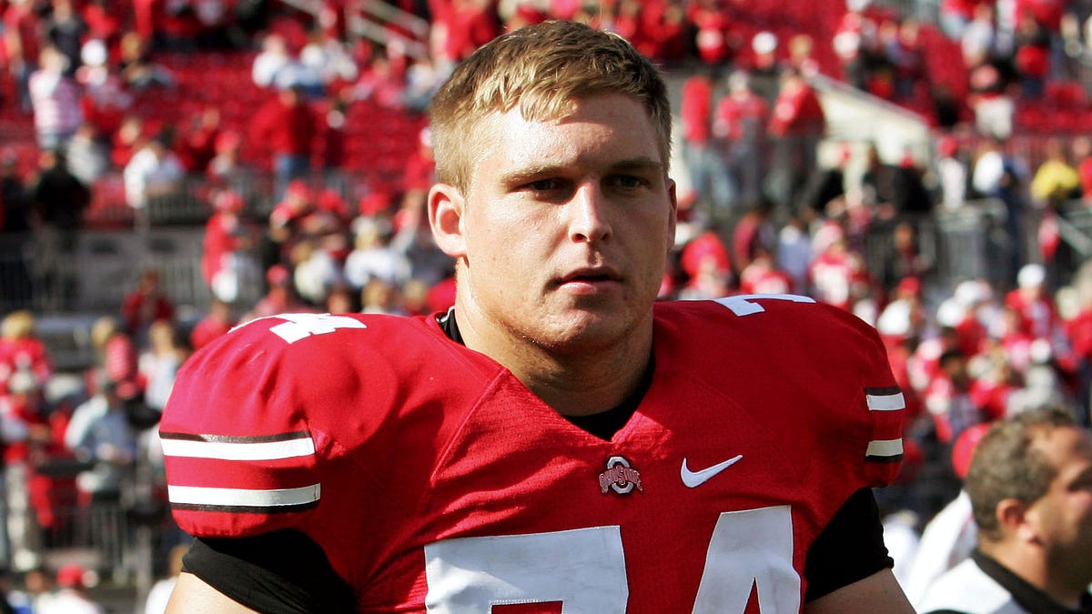 Kirk Barton walks on field