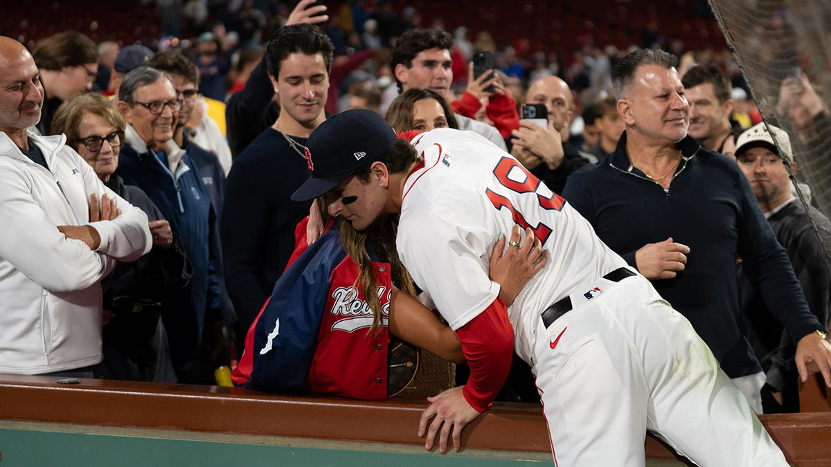 Lia Anthony hugs brother, Red Sox prospect Roman Anthony
