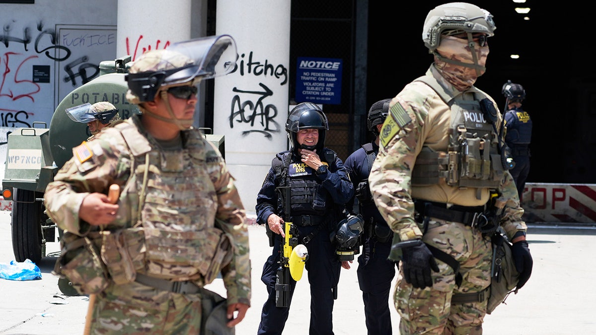 National Guard and DHS police standing guard outside buildings