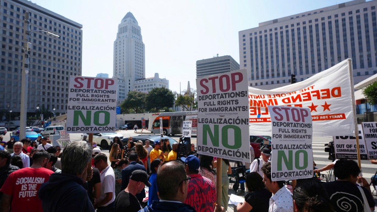 Community organizers protest outside the Federal Building after federal immigration authorities conducted an operation Friday, June 6, 2025, in Los Angeles. 