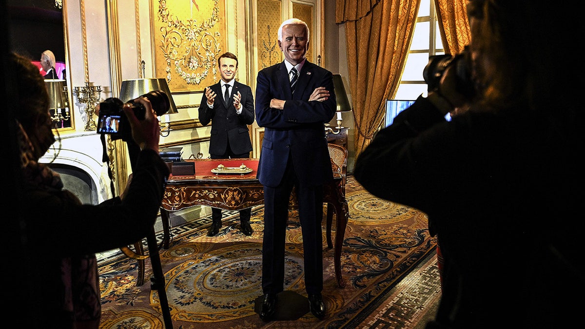 Macron and Biden wax statues