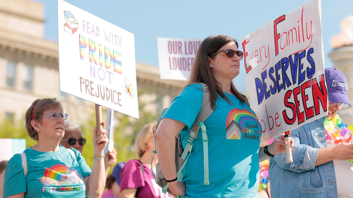 LGBTK Holding Character Protesters