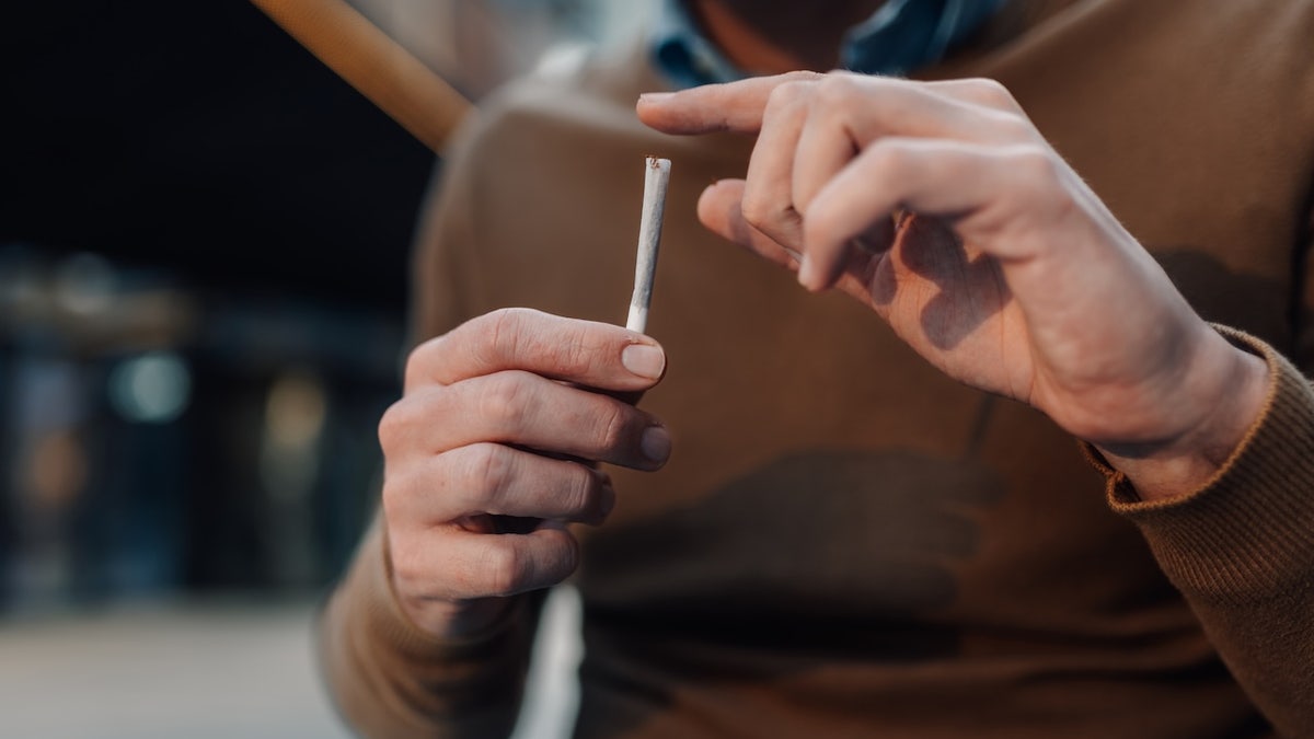 Man holding joint