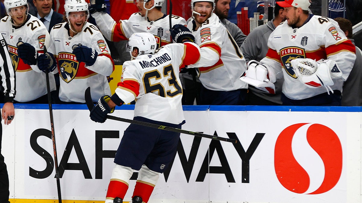 Brad Marchand with teammates