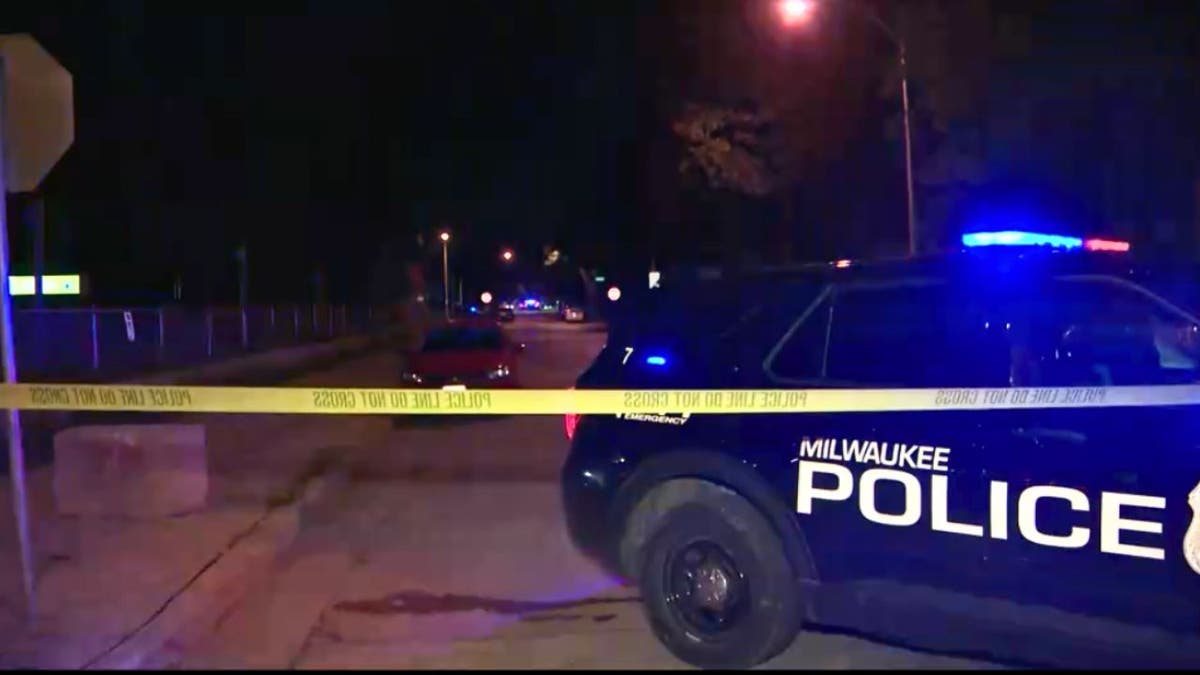 A Milwaukee police vehicle at a crime scene