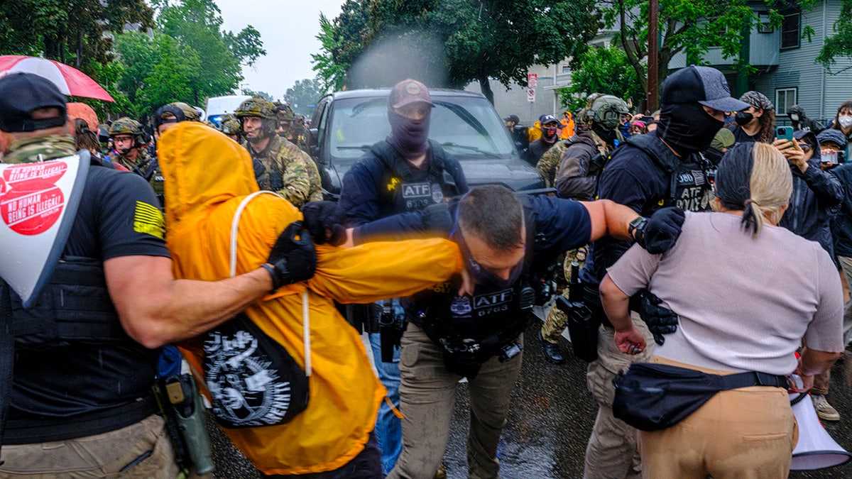 Federal agents, protesters clash in Minnesota