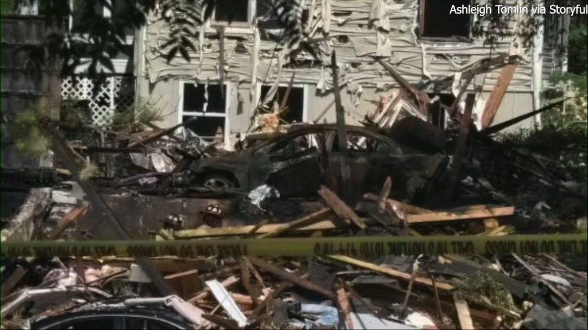 car burnt with debris everywhere